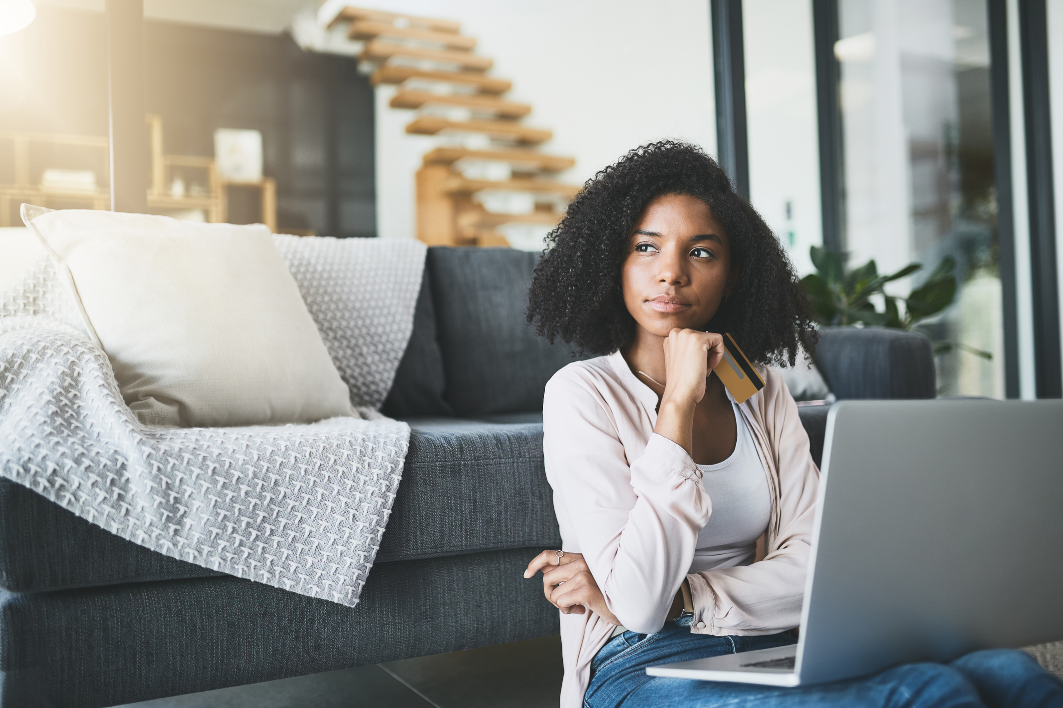 woman considering taking out a loan