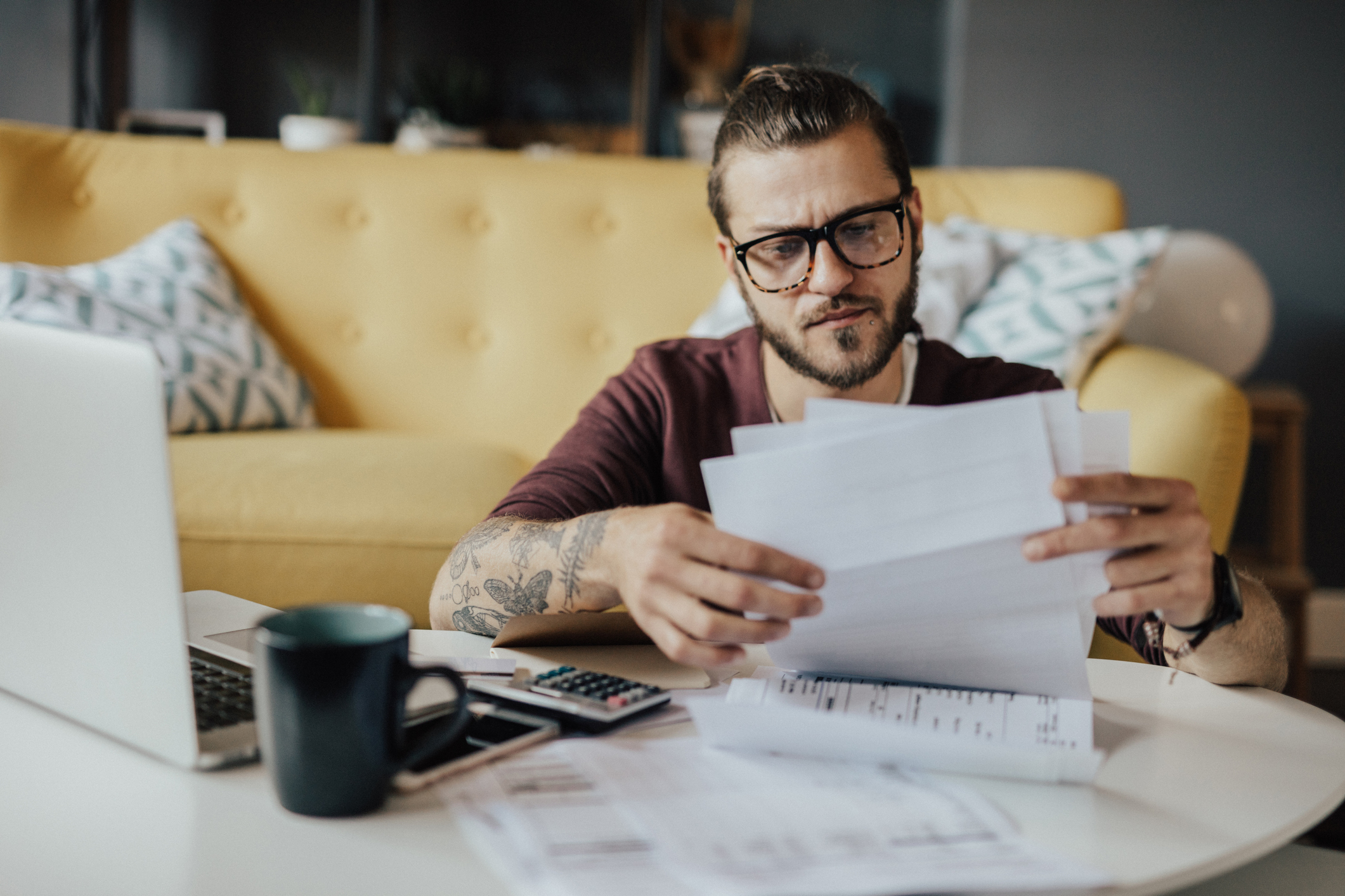 man checking his invoices